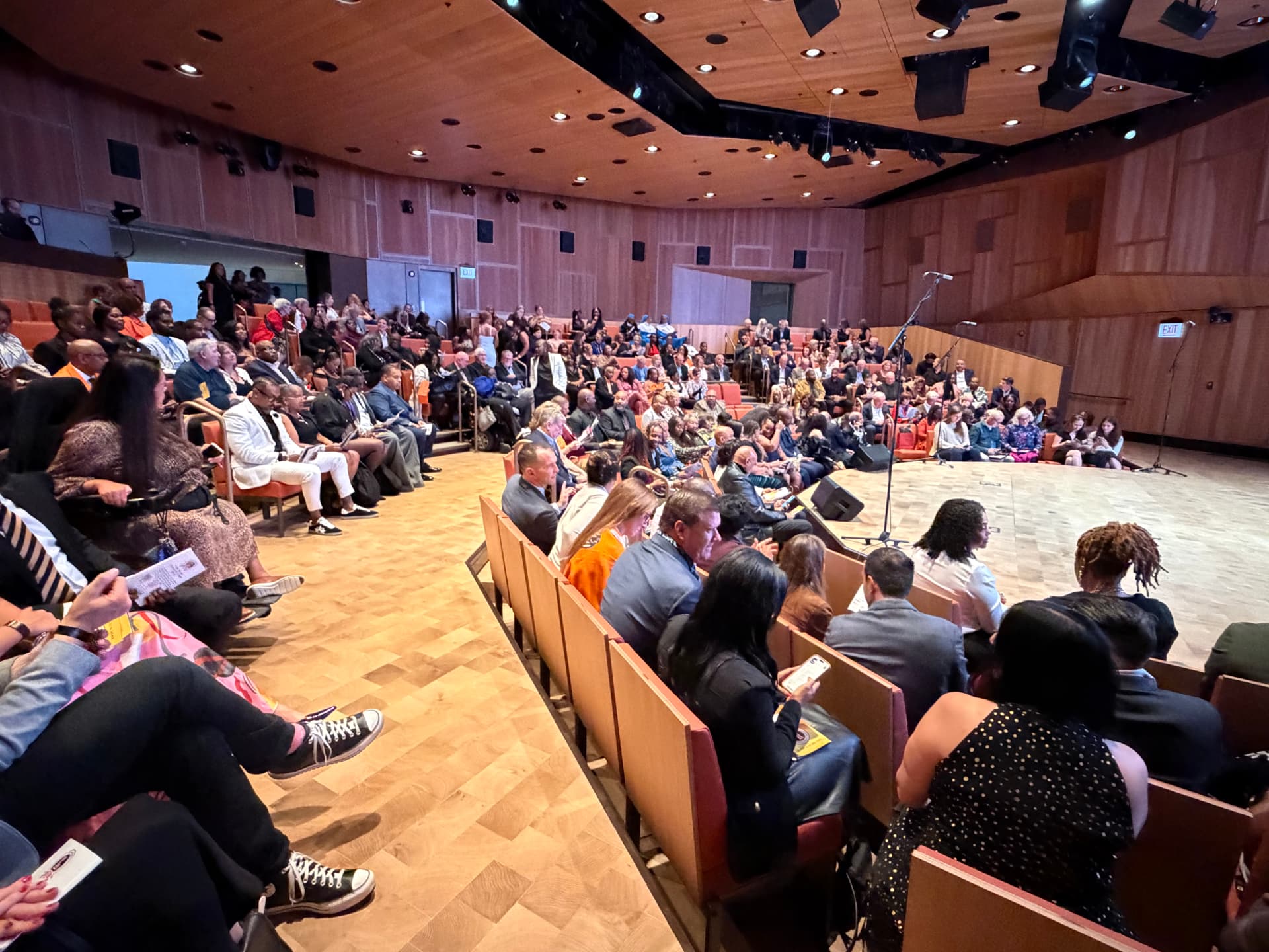 A full auditorium of guests waiting for the concert to begin